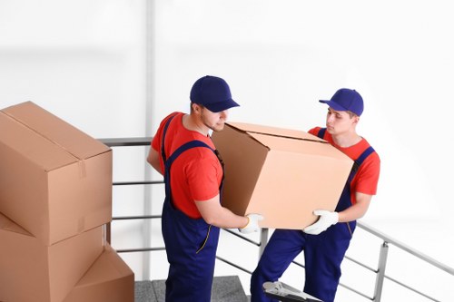 Moving team planning a home relocation in South Kensington with careful access awareness