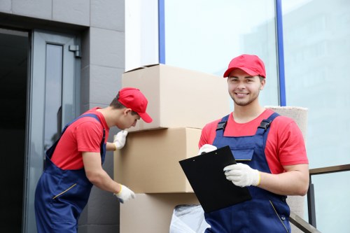 Furniture removals team handling items in South Kensington