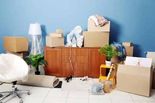Moving boxes and labelling materials prepared for a South Kensington property