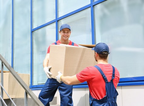 Packed boxes and furniture ready for a South Kensington apartment move
