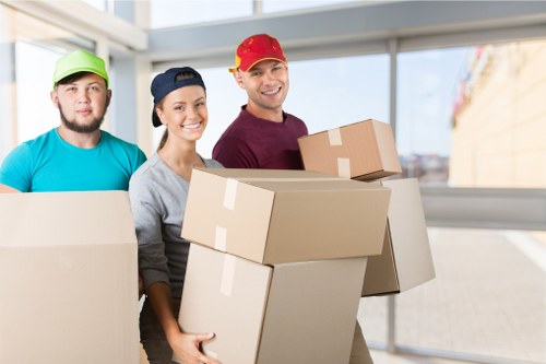 Movers transporting office equipment for a same day commercial move