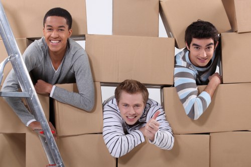 Careful unloading of household items at a South Kensington apartment building