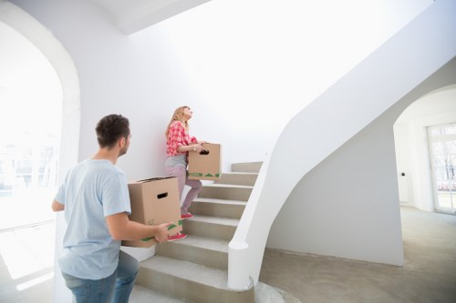 Loading furniture and boxes into a van in South Kensington