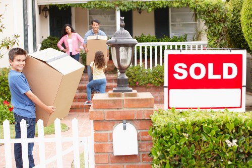 Local moving team handling access in a South Kensington street